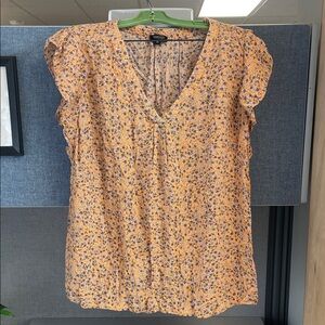 Orange floral blouse
